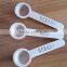 Mini wooden Spice Spoon with customized cartoon design soft PVC logo cap or head
