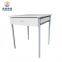 Product descriptions from the supplier Overview Product Description Size 700*700*750mm Desk TOP Top is MDF 18MM, PVC edges Frame Round Tube with Powder Coating Packing Folding legs, CKD,1 set/Carton Color White top,Gray base like,Maxima chair RAL  Product