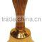 antique brass bell with wooden handle