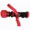 Handheld fire hose nozzle with machino female coupling