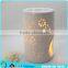 Flower logo carved ceramic aroma burner Porcelain fragrance burner for spa promotion                        
                                                Quality Choice