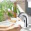 Integrated temperature sensing faucet