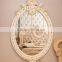 Graceful flower carving oval wall mirror