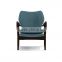 Mid-century walnut finished modern green fabric upholstered club chair with sleek polished wood arms