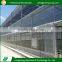 Customized design hot galvanized anti-fog commercial greenhouse for sale