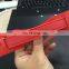 Red plastic handle for carton packing