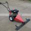Two wheel tractor with sickle bar mower