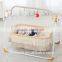 Luxury Automatic baby swing bed with mosquito net