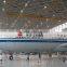 Low cost long span steel arch hangar