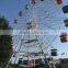 outdoor park rides carnival Vintage Ferris Wheel at night