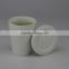white ceramic jar candle with lid