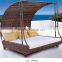 Elegant outdoor wicker daybed with mosquito nets and supports rod