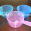 Clear plastic water ladle or soup ladle