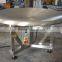 Rotary collecting table for bags or cartons