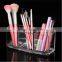 Acrylic brush holder with lid in cosmetic bags / cases