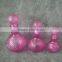 Pink glass perfume bottle