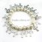 Handmade bracelet chain with 8 mm white glass beads and hollow-out cross