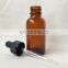 Empty amber glass essential oil bottle with dropper 30ml