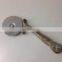 brass antique pizza cutter
