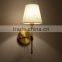 Bronze hotel room bedding wall light