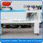 Shrink tunnel wrapping machine