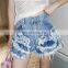 TWOTWINSTYLE Shorts For Women High Waist Patchwork Ruffles Streetwear Denim Asymmetrical Loose