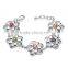 China wholesale raw brass flower shape white gold plated bracelet inlaid multicolor CZ stone