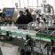 Automatic shampoo bottle filling machine with conveyor