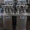 China Guangzhou factory small perfume bottle four head filling machine/equipment with negative pressure for sale