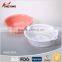 colorful round plastic kitchen fruit sieve with tray