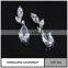 Simple gold earring designs for women with big diamond earring