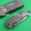 OEM titanium surface folding knife with 5CR13MOV blades