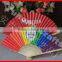 Red hand paper fan made from Zhejiang China