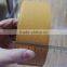 Yellow cork cigarette tipping paper with perforated hole