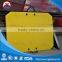 Yellow uhmwpe truck loading outrigger pads with handle