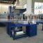 Automatic sleeve wrapper and PE thermal shrink packing machine