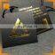 Hot sale custom black card paper hang tag/gold foil center folded swing tag
