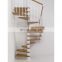 White iron spiral stairs with black handrails