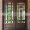 Villa entrance teak wood main double door design with glass