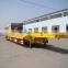 Low loader / low bed truck trailer used to transport crawl equipment