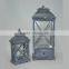 Brown wooden candle lantern with drawers