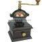 archaistic manual coffee grinder with ceramic burr and wooden case