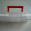 White plastic toolbox with red handle