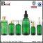  china cosmetic packaging essential oil 100ml dropper bottle beautiful high quality green glass dropper bottle wholesale