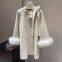 A rich girl's cloak coat with a loose design for autumn and winter, a petite wool woolen coat with a bow on both sides