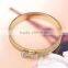 China wholesale gold plated jewelry zinc alloy rhinestone bowknot bangle for girls