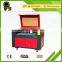 low cost high quality co2 laser tube acrylic paper wood cutting co2 laser cutting machine/photo machine