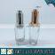 30ML clear cosmetic glass bottle with press pump dropper