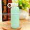 best price hot sale cute small glass water bottle with colorful silicone sleeve