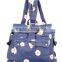 The new 2015 printed canvas backpack female wave point Reduce wear large capacity travel bag shopping bag